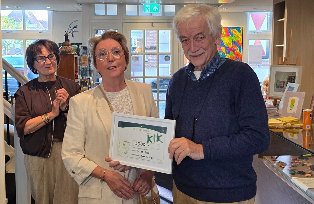Overhandiging van de Cheque.